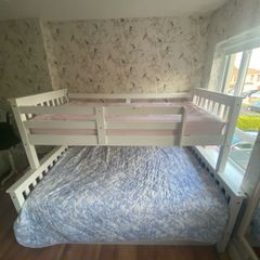 Wooden triple bunk bed