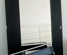 large wooden mirror