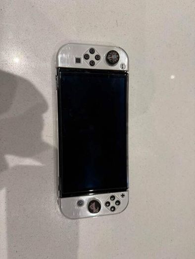 Nintendo Switch Oled include 4 Games,  Pro Controller