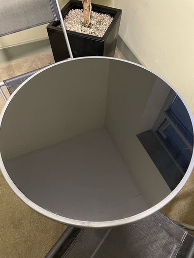 Two folding chairs and a table