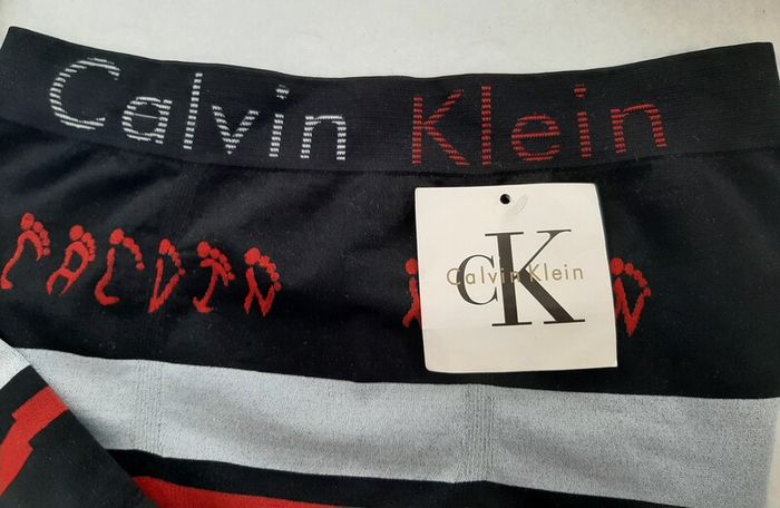 Calvin Klein tag attached