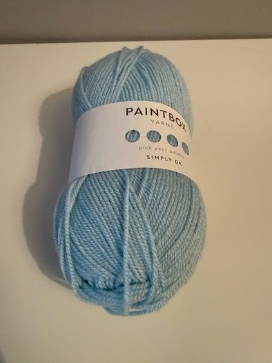 6 balls of blue yarn wool