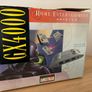 Boxed Amstrad GX4000 console with 2 controllers, cables, inserts, and pack-in game Image 3