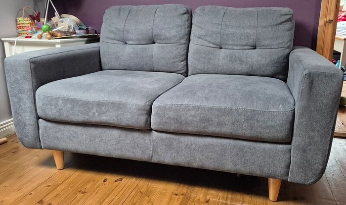 Compact grey 2 seater sofa