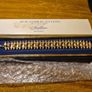 Rare Find. 1960s Avon Starflower gold plated bracelet in original box. Image 3