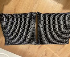 Two navy cushions