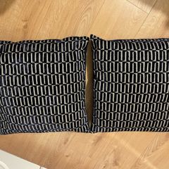 Two navy cushions