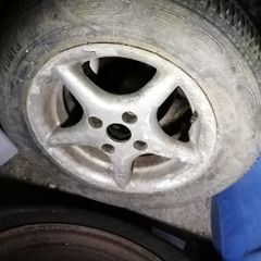 These fit Honda / Toyota, one 13" rim and one 13" alloy, 4 stud type