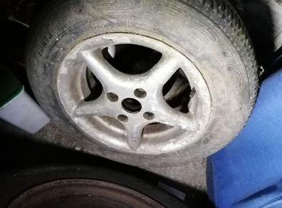 These fit Honda / Toyota, one 13" rim and one 13" alloy, 4 stud type
