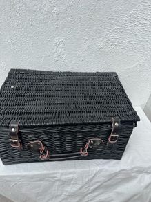 Black wicker picnic basket with leather straps