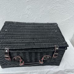Black wicker picnic basket with leather straps