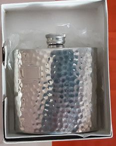 white metal hip flask