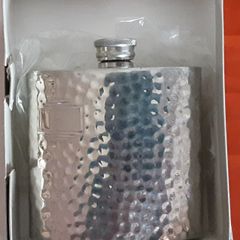 white metal hip flask
