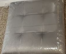 Grey ottoman footstool