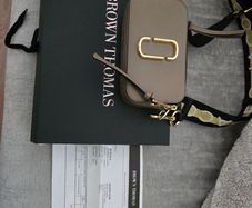 Marc Jacobs the Snapshot camera bag open to offers