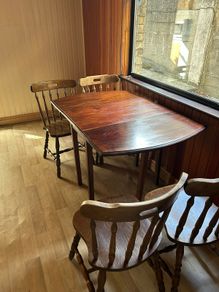 Wooden dining table and six chairs