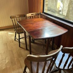 Wooden dining table and six chairs