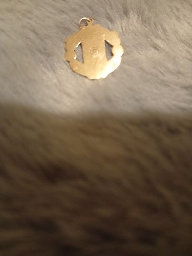 Gold pendant Manchester United