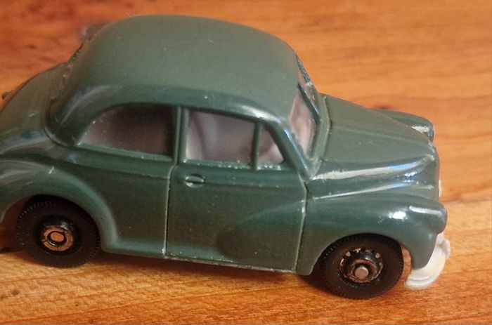 4 vintage toy cars -