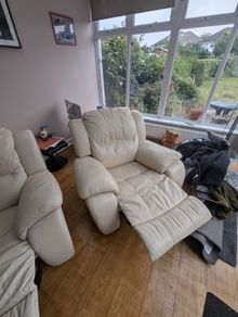 2 leather manual recliner chairs