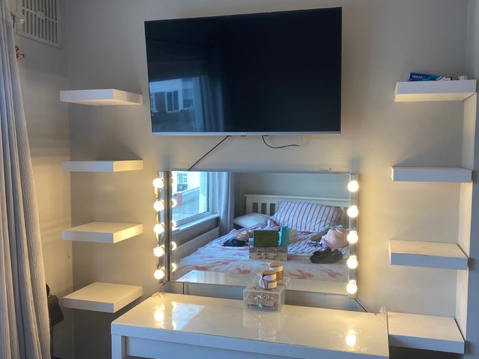 White dressing table with mirror, Hollywood lights, shelves and chair