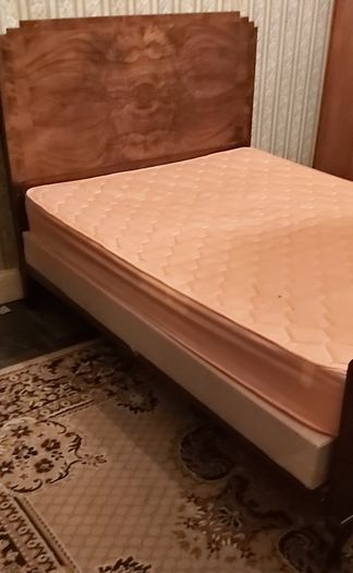 A Wooden Metal Framed Double Bed