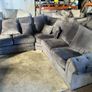 Grey corner sofa with scatter cushions Image 4