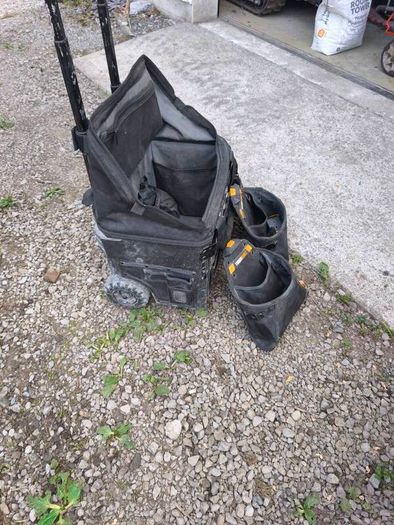 tough built rolling tool bag with various pouches