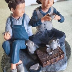 Chloe by Genesis from the workshops of Mullingar Ireland figurine having a picnic