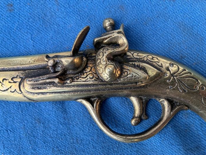 Vintage solid brass wall hanging pistol