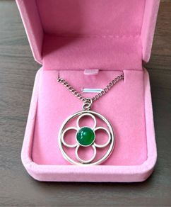 Sterling silver necklace with four -leaf floral pendant