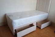 Single beds, cream, pink and navy blue
