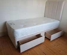 Single beds, cream, pink and navy blue
