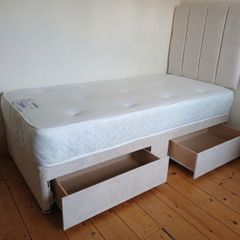 Single beds, cream, pink and navy blue