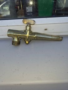 old brass  whiskey  tap