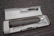 Oral-B electric rechargeable toothbrush with a travel case