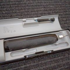 Oral-B electric rechargeable toothbrush with a travel case