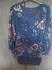 woman's top with tags. New