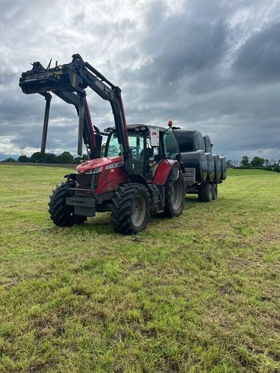 Hauling bales and stacking