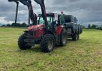Hauling bales and stacking