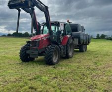 Hauling bales and stacking