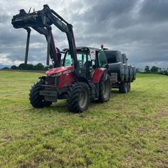 Hauling bales and stacking