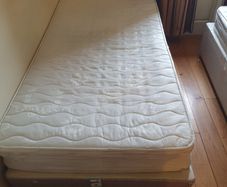 4 single beds with mattresses