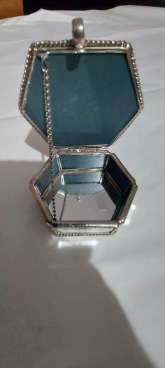 Lovely jewellery box ,,with bevelled mirrors sides and design, see pictures for condition,,take as is ,buyer collects or pays postage thank you