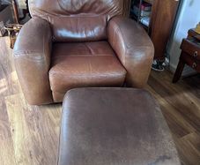 Armchair brown leather and footstool