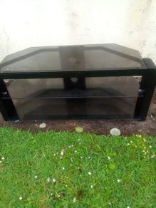 Television.  Glass. Table.  Unit
