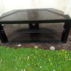 Television.  Glass. Table.  Unit