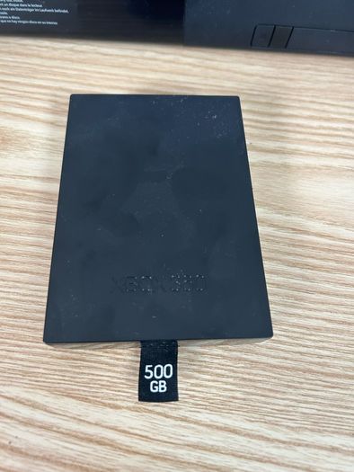 xbox 360 500gb with a controller