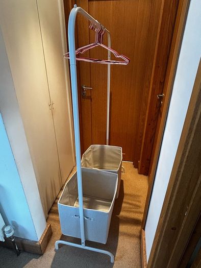 Clothing rail, hangers and storage boxes