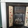 Fireplace in cast iron with wooden surround (painted white) and black marble hearth.   Perfect condition Image 5